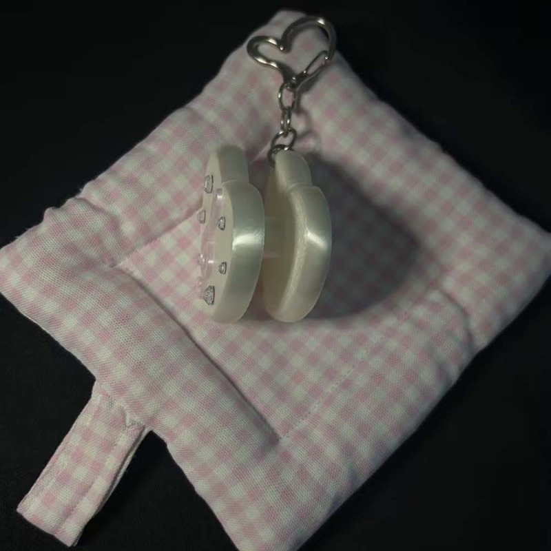 منظم كابلات على شكل قلب بتصميم - مراجعة Cable Winder Keychain وسعره